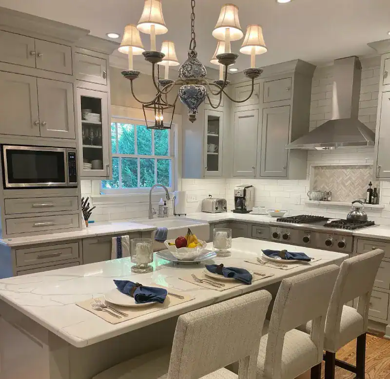 Elegant kitchen remodeling Kansas City with marble island and custom cabinetry by The Home Remodeling Contractor Kansas City Trusts | Stag Homes Design Build in Kansas City