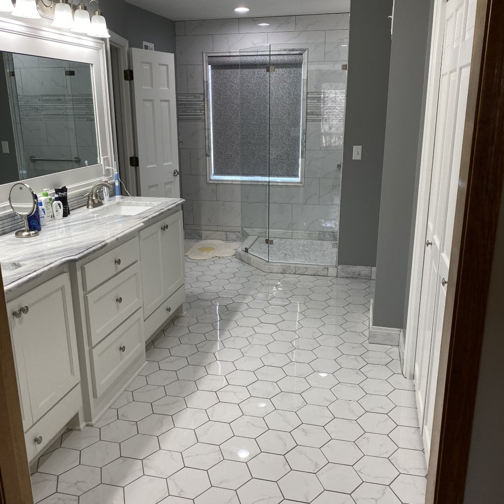 Elegant high-end bathroom remodel showcasing functional layout, custom storage, and spa-inspired design by Stag Homes Design Build in Kansas City