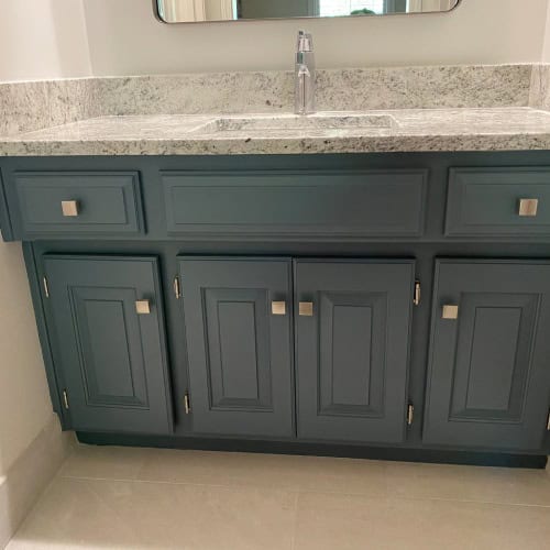 Blue Vanity Bathroom Renovation By Stag Homes Design Build In Kansas City Bathroom vanity with blue cabinetry and granite countertop by Stag Homes Design Build in Kansas City